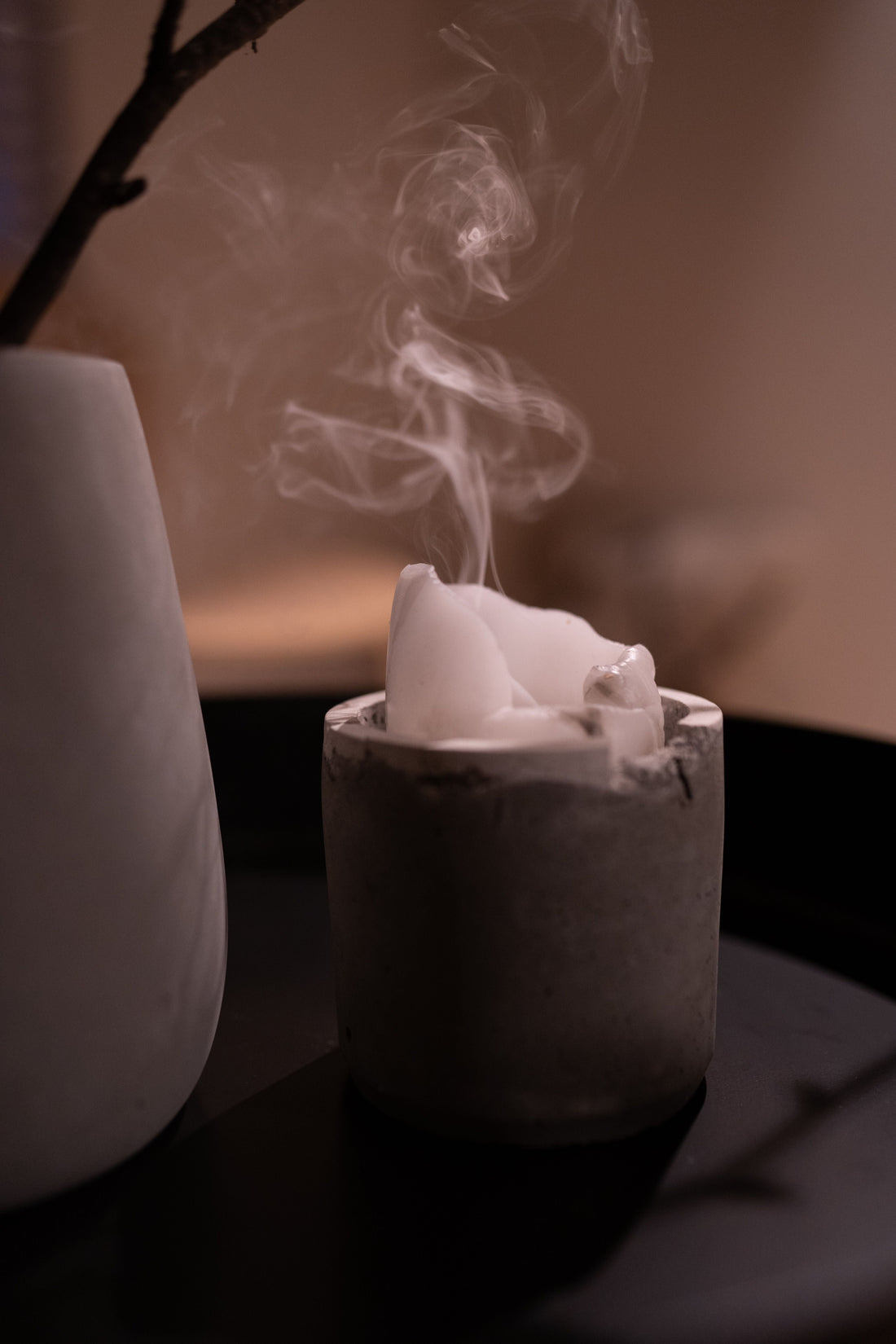 A curl of smoke - warm amberwood and cedar candle scents